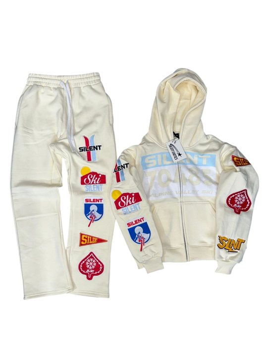 70485 CREAM SET featuring a lightweight cotton hoodie and pants, perfect for any weather, with various patches.